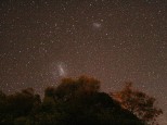 Small and Large Magellanic Clouds as viewed from Anglesea, Victoria. 30 x 60 sec exposures taken with Canon 400D DSLR at ISO 800 with aperture at 4.0., lens focal length at 18mm. Processed with Startrails.