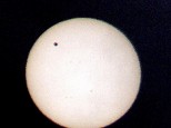 Transit of Venus, 6 June 2012.  A humble shot taken with an iPhone of an image projected onto paper through Nikon 8x21 binoculars.